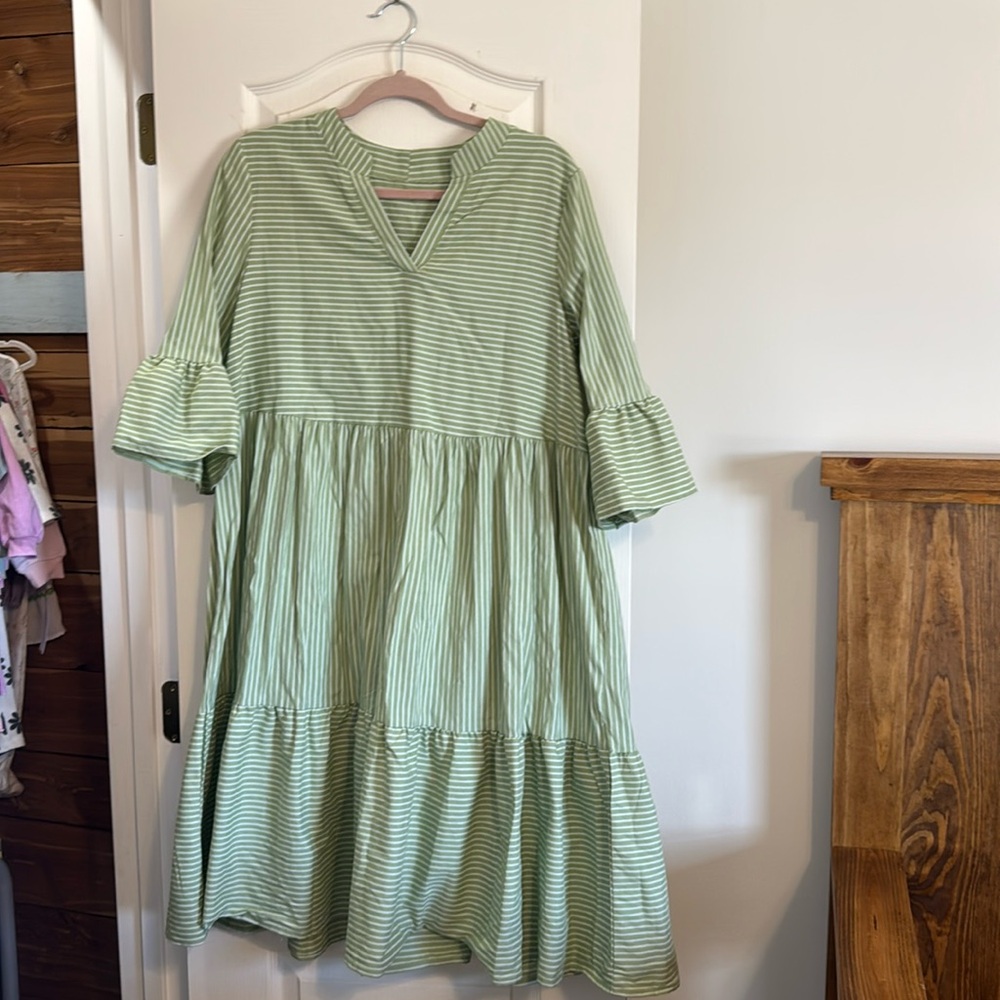 Green and white stripped midi dress
Not tagged but would say it’s size Large